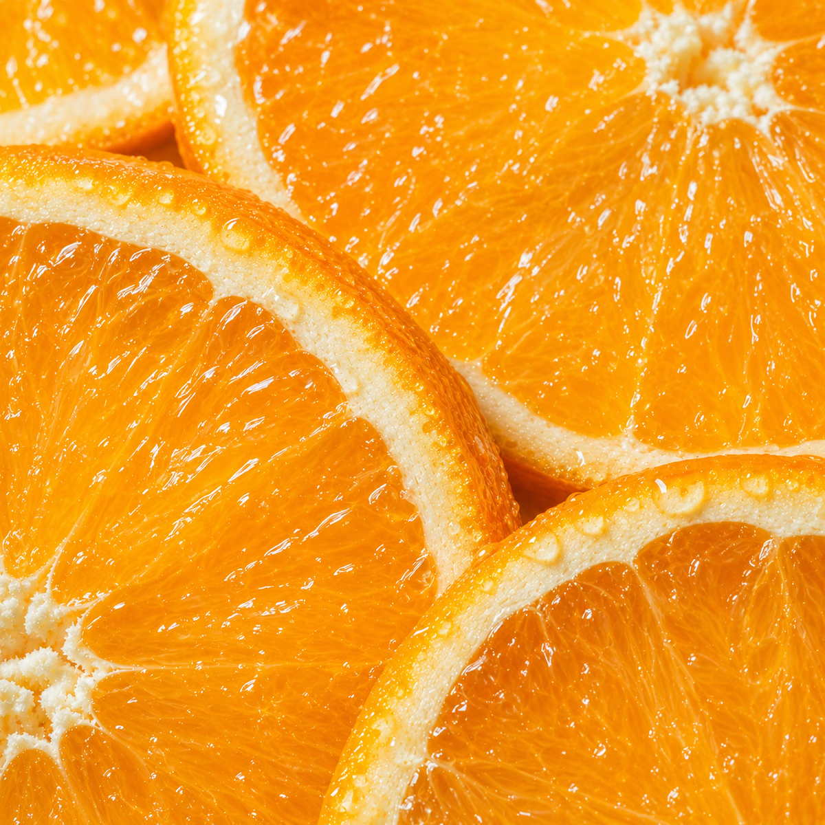 Close-up of sliced oranges with a focus on texture and color.